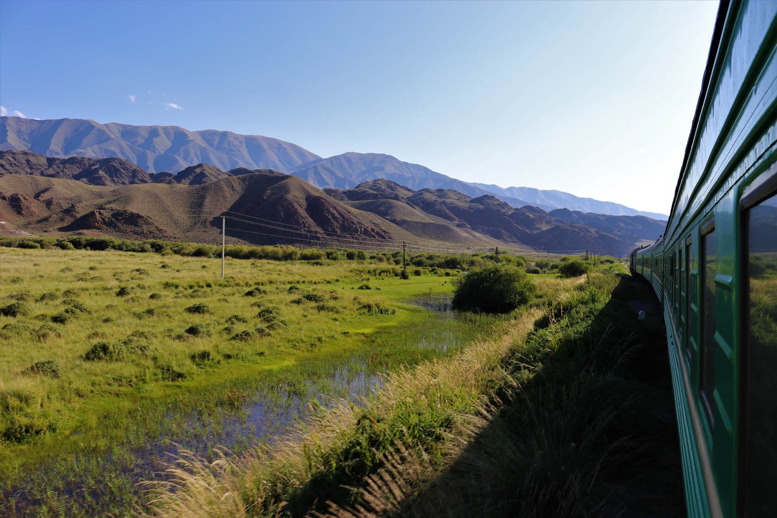 soviet era train en route to Bishkek from Balykchy through boom gorge